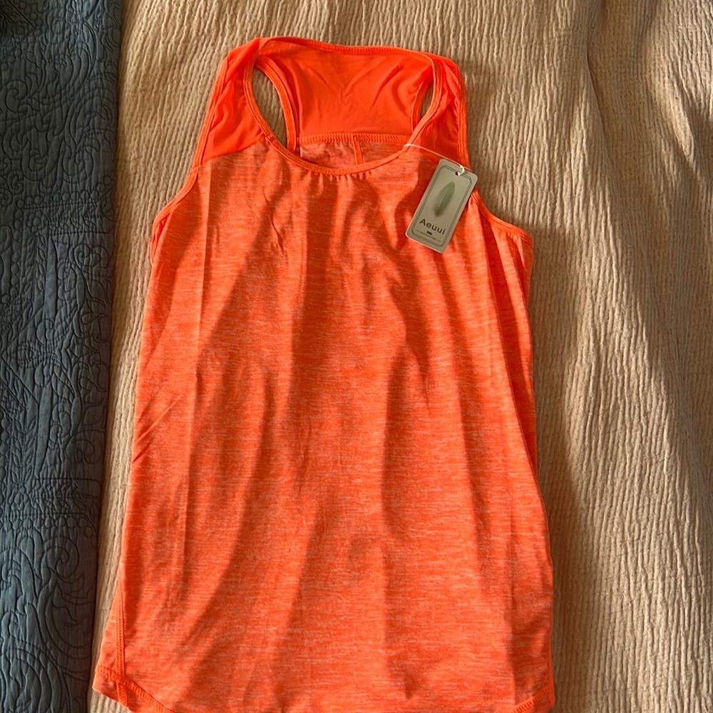 NWT Aeuui workout tanktop.  Mesh top and cute split back.  Bright orange.